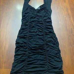 Forever21 Ruched Bodycon Mini Dress is a size Medium.
